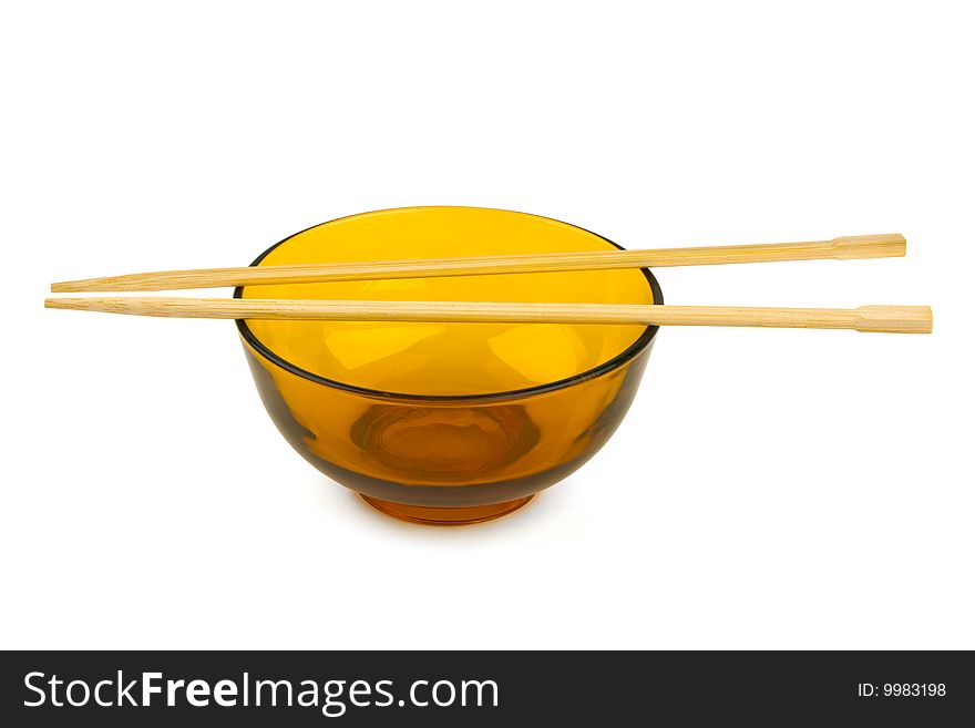 Bowl and chopsticks isolated on white background