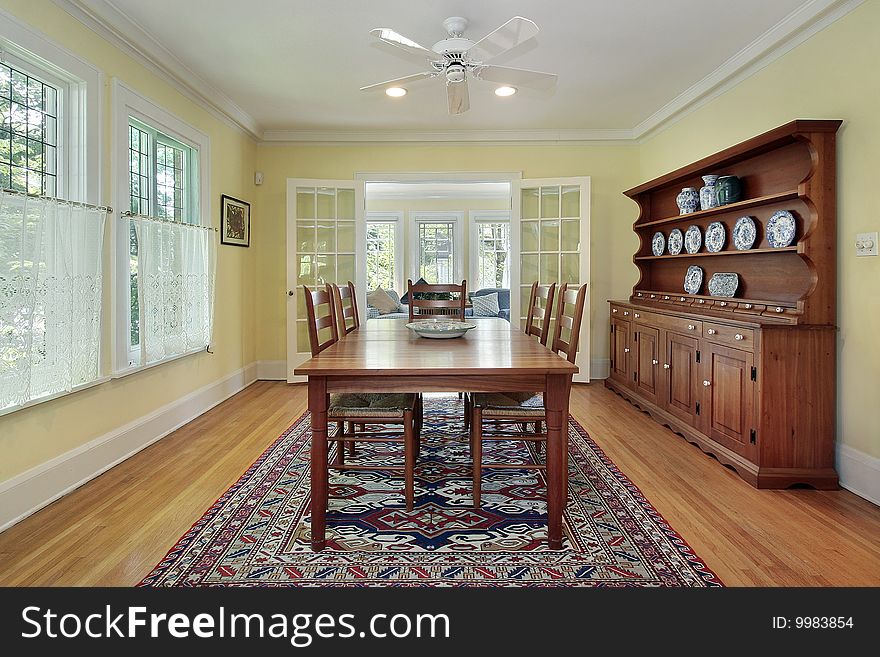 Dining room in suburban home with wood cabinetry