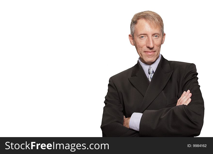 Mature businessman in a suit isolated on white. Mature businessman in a suit isolated on white