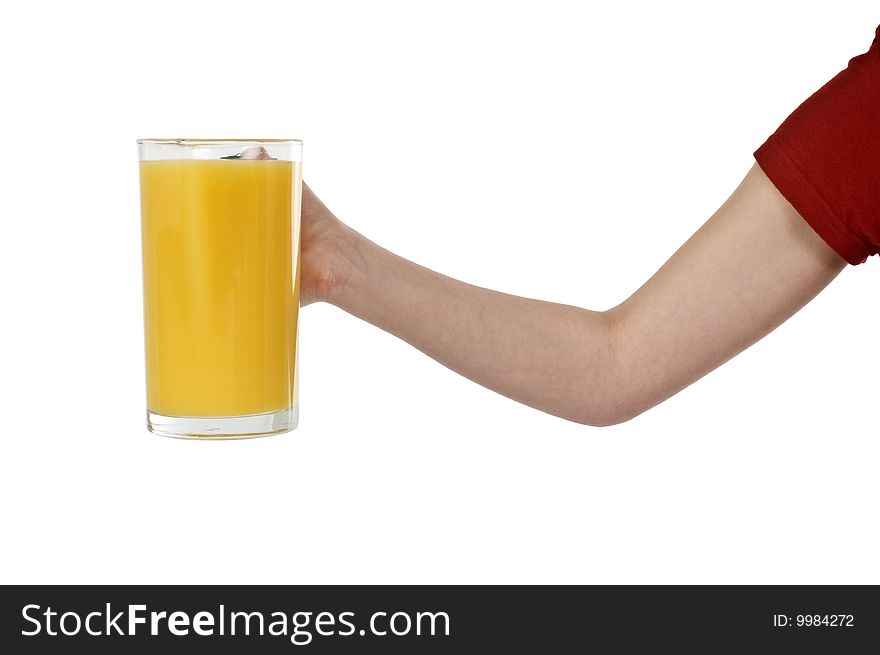 Hand keeping the jug with the orange juice. Hand keeping the jug with the orange juice