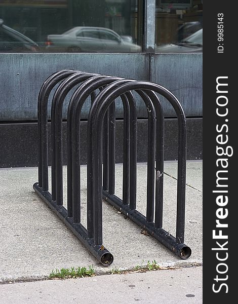 Empty bicycle rack on the side walk