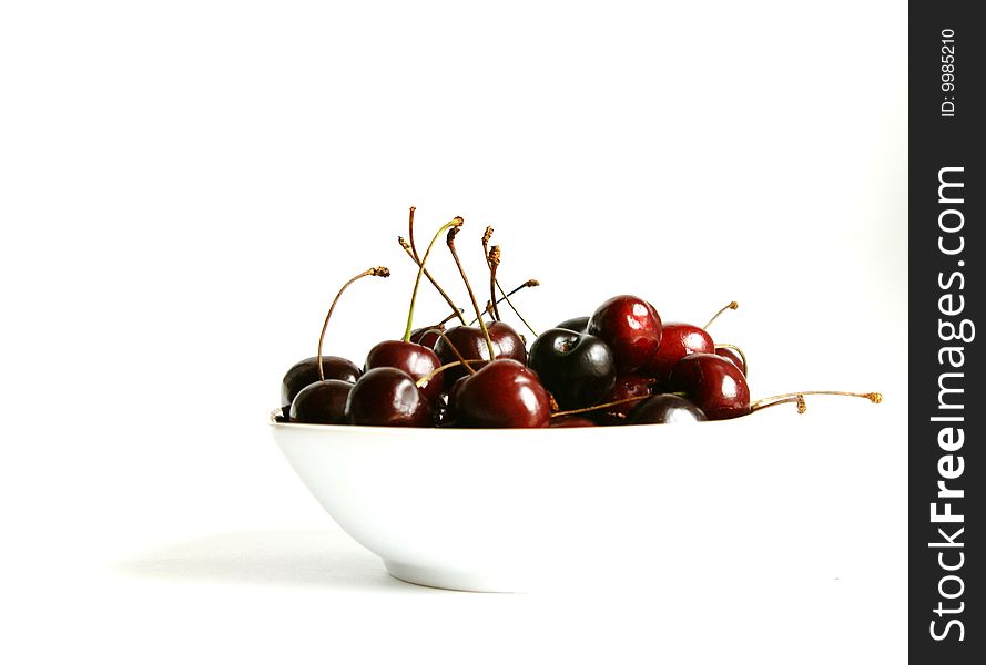 Sweet cherry on a white background. It is removed by close up at a short distance