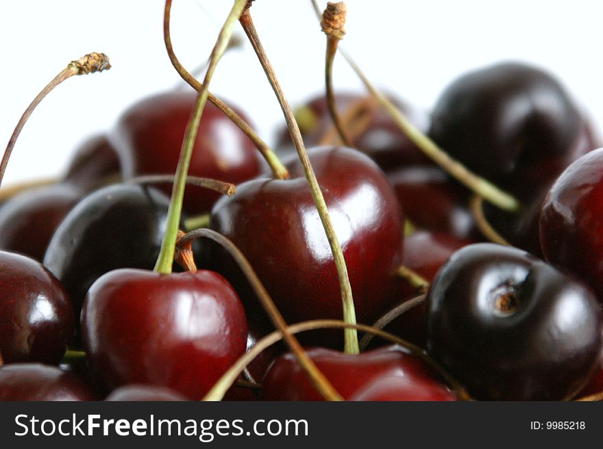 Sweet cherry on a white background. It is removed by close up at a short distance