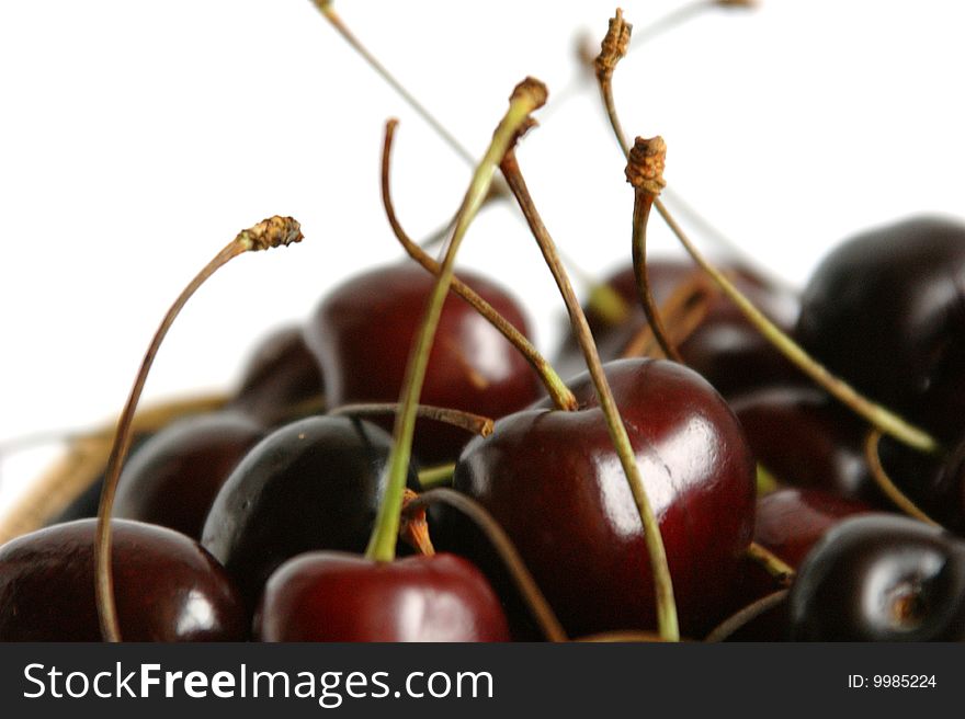 Sweet cherry on a white background. It is removed by close up at a short distance