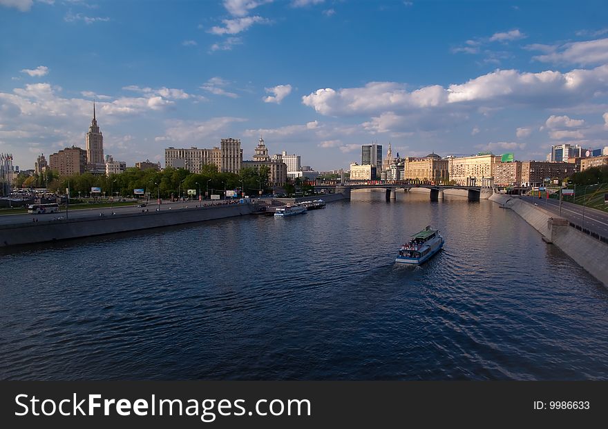 Bridge and boat at Moskva river in Moscow, Russia - panoramic. Bridge and boat at Moskva river in Moscow, Russia - panoramic