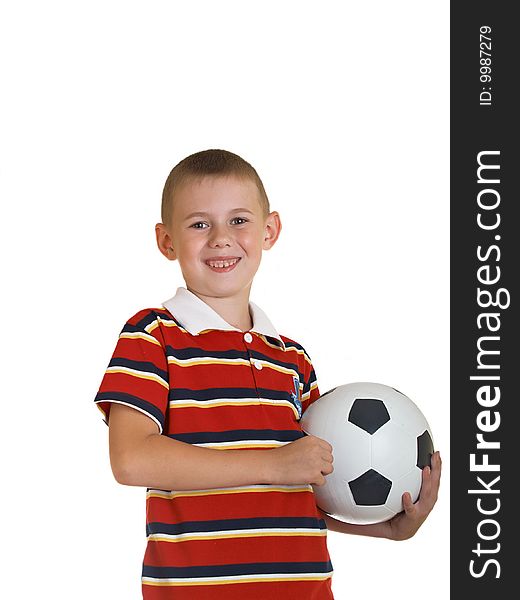 Young boy holding football in his hand. Young boy holding football in his hand