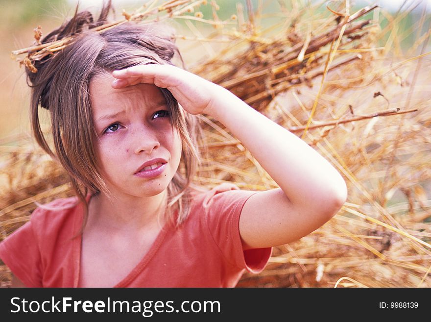 Girl standing in fan and looking in nature. Girl standing in fan and looking in nature