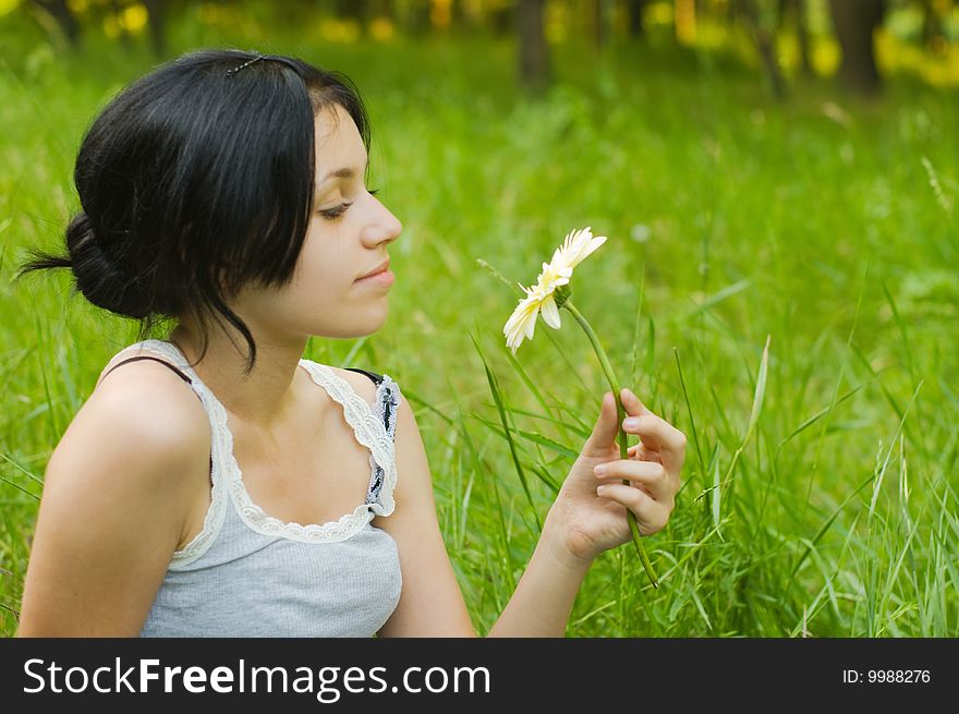 Portrait of beauty girl on meadow