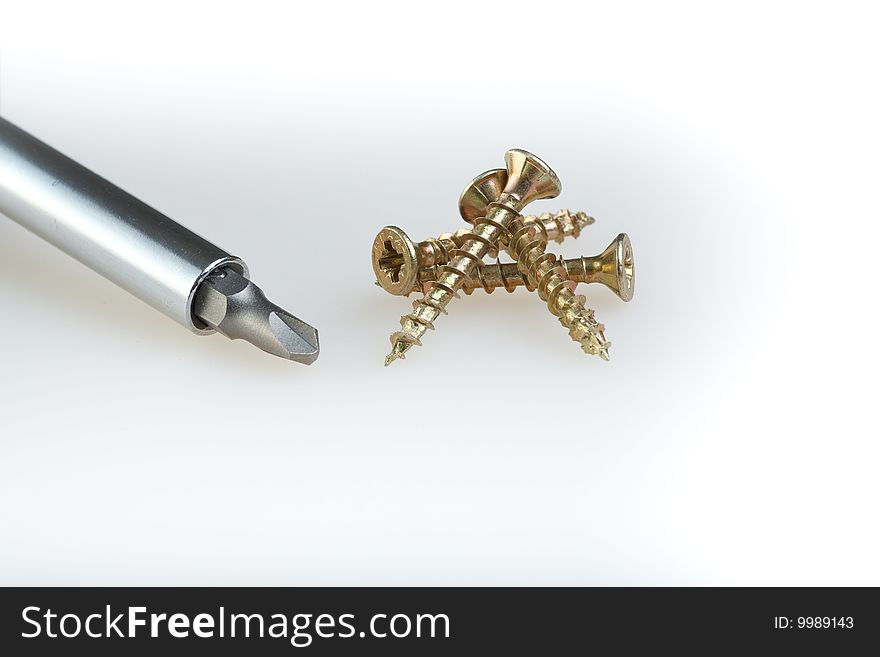 Some screws arranged on a white background, isolated. Some screws arranged on a white background, isolated.