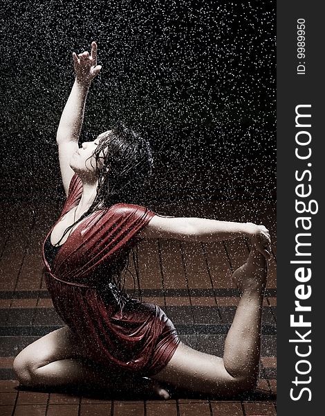 Ballet dancer dancing in the rain. Ballet dancer dancing in the rain