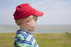 Boy Gazing Out To Sea Royalty Free Stock Photography Boy Gazing Out To Sea Royalty Free Stock Photography
