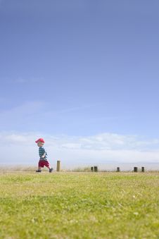 Cute Toddler Running By Sea Royalty Free Stock Photos