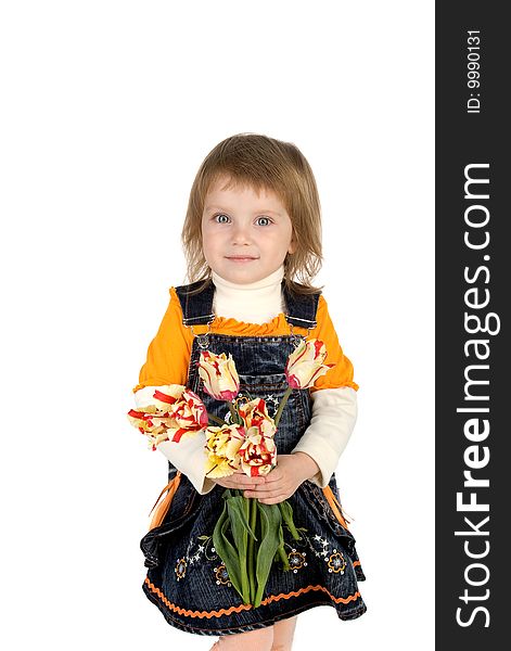 Cute little girl giving tulips. Studio shot