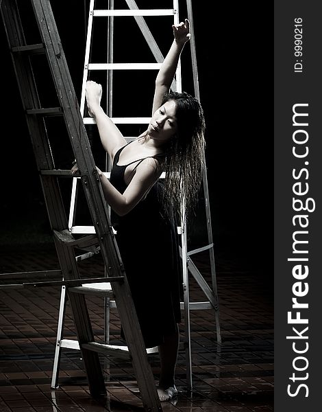 Ballet dancer dancing on ladders. Ballet dancer dancing on ladders