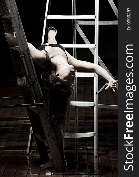 Ballet dancer dancing on ladders. Ballet dancer dancing on ladders
