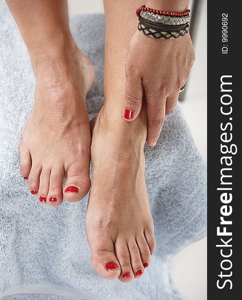 Female feet with red toe nails. Female feet with red toe nails