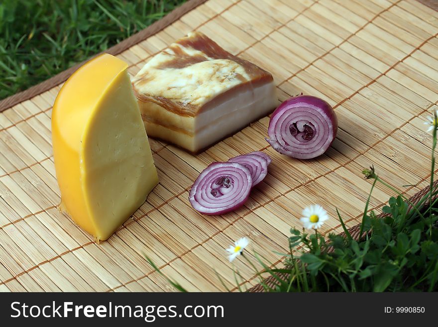 Traditional picnic breakfast, cheese, onion, bacon