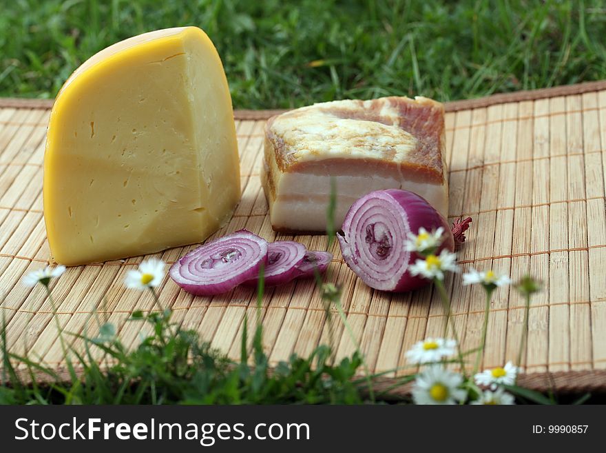 Traditional picnic breakfast, cheese, onion, bacon