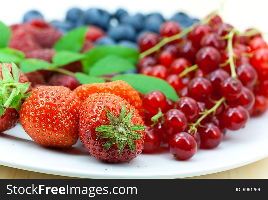 Fresh ripe summer berries background.