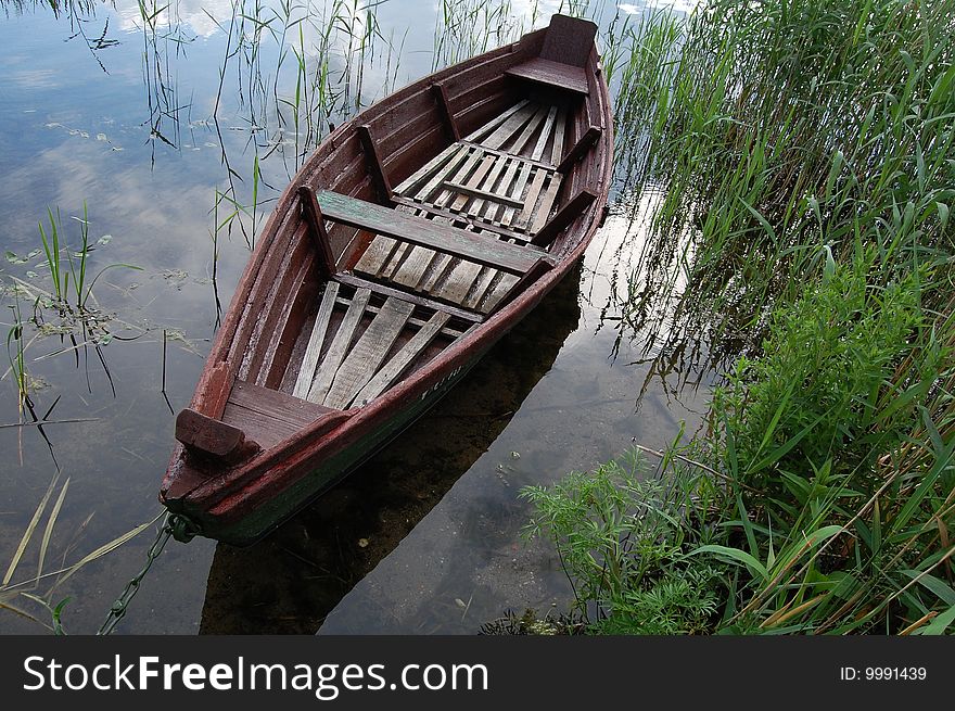 Lake and boat at summer time. Lake and boat at summer time