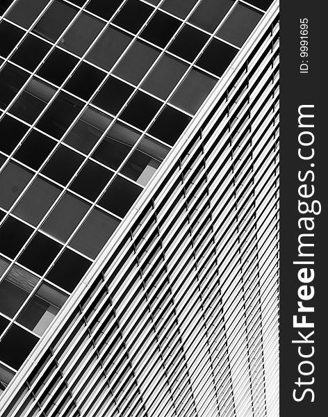 Building glass facade structure with windows, black and white. Building glass facade structure with windows, black and white