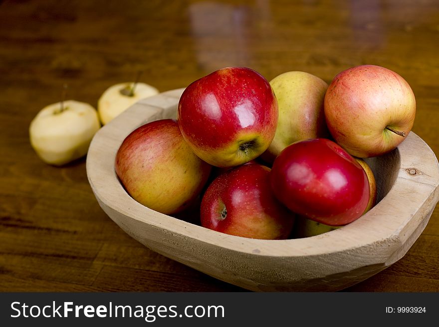 Wooden pan full of apples in kitchen. Wooden pan full of apples in kitchen