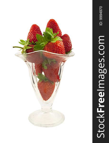 Fresh strawberry in a glass on a white background