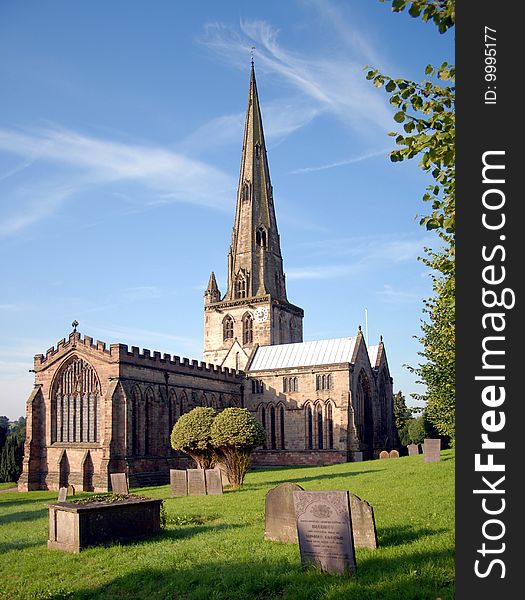 A very old church surrounded by a grave yard in the UK. A very old church surrounded by a grave yard in the UK