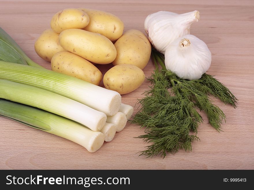Fresh mixed  vegetables on wooden board  closeup