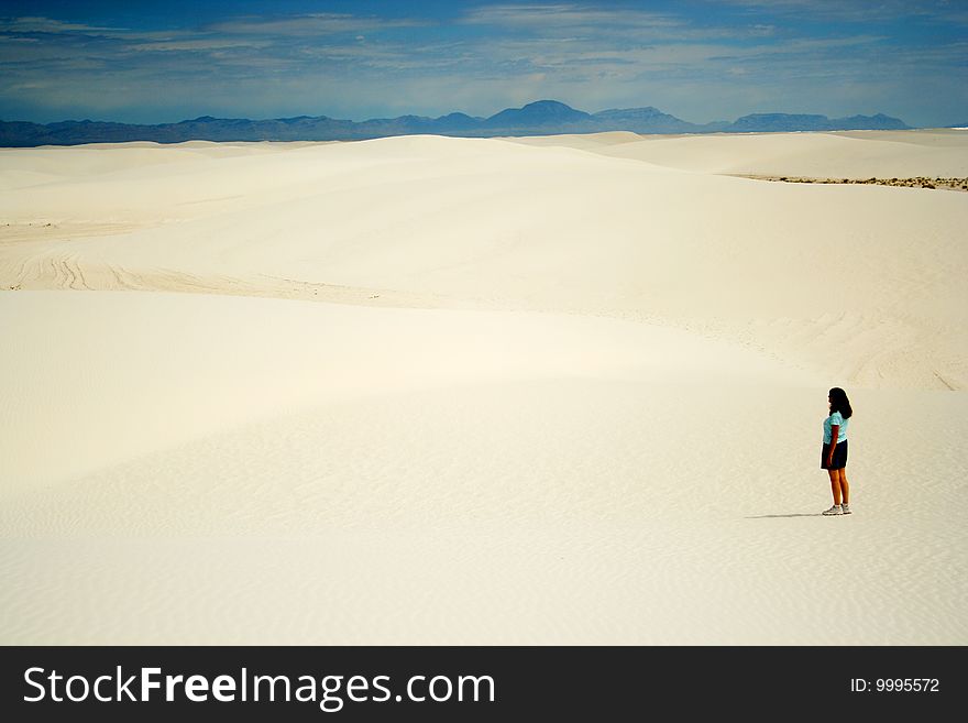A Woman Contemplates White Sands National Monument