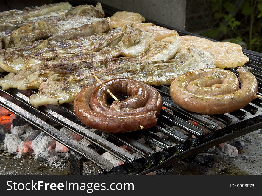 Sausage, Pork Chop,and Chicken Gegrilled