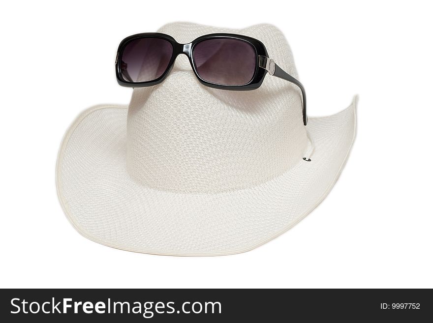 Hat with fields and sunglasses insulated on white background. Hat with fields and sunglasses insulated on white background