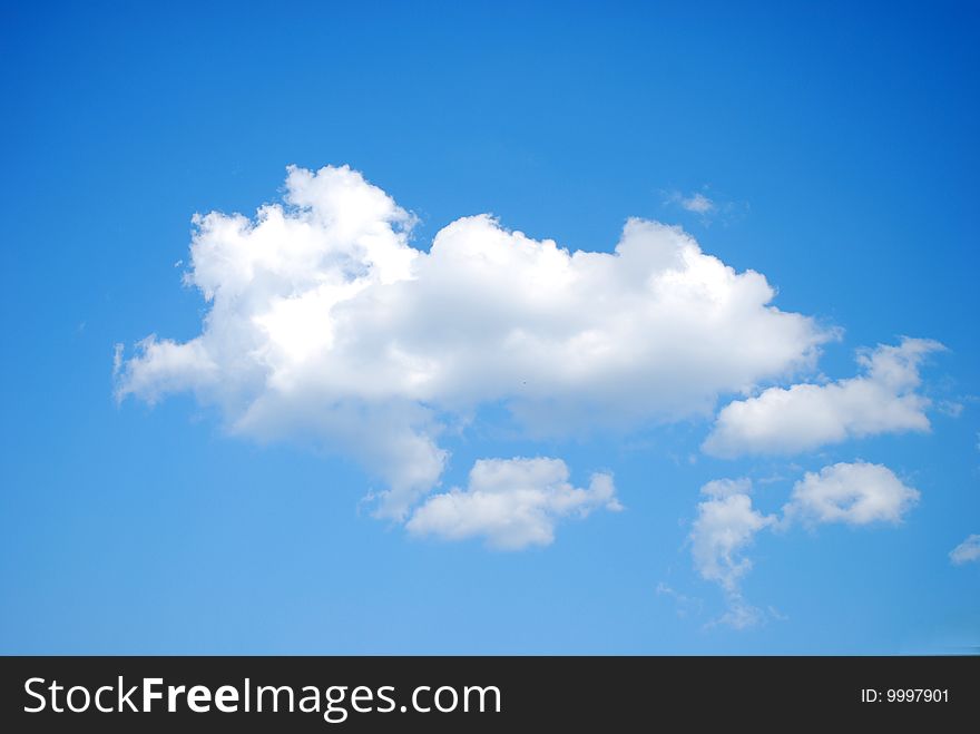Fluffy White Clouds on Blue Sky