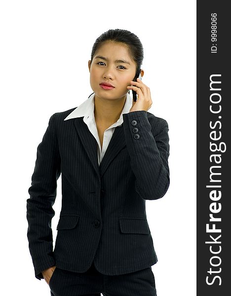 Beautiful business woman on the phone, isolated on white