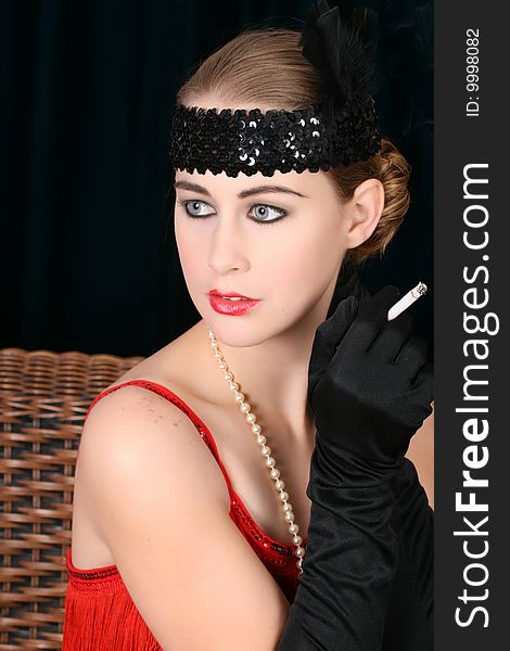 Beautiful young female in 1920 style attire. Beautiful young female in 1920 style attire