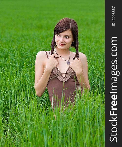 A portrait of a beautiful woman in a countryside