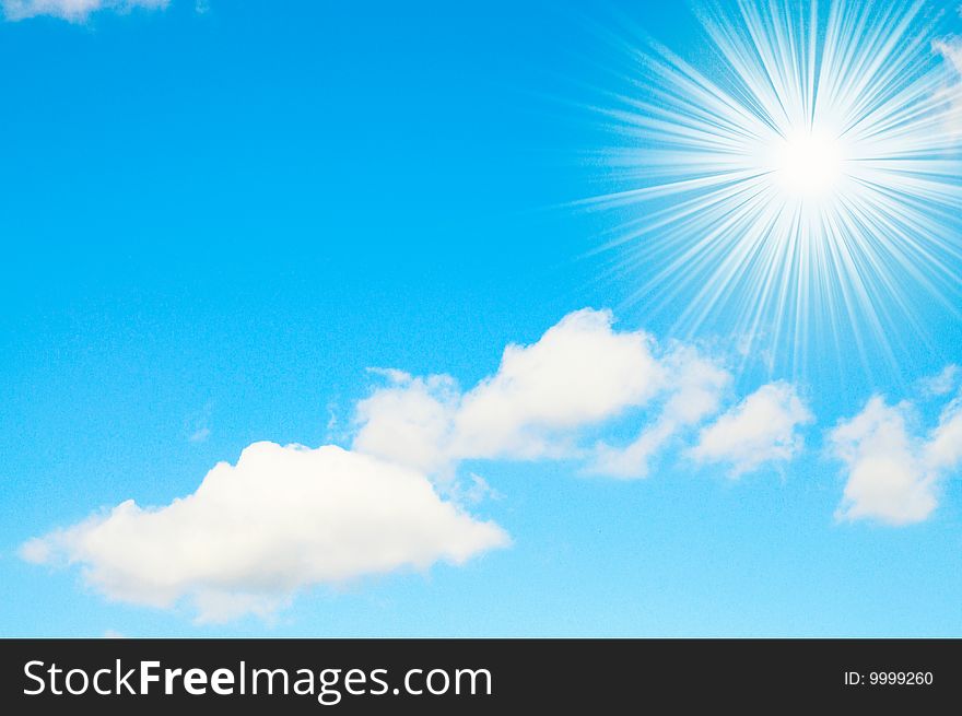 Fun sun and white clouds on a blue sky. Fun sun and white clouds on a blue sky.