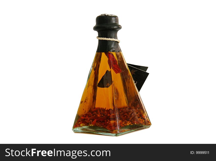 Chilli oil in a pyramid shaped glass bottle