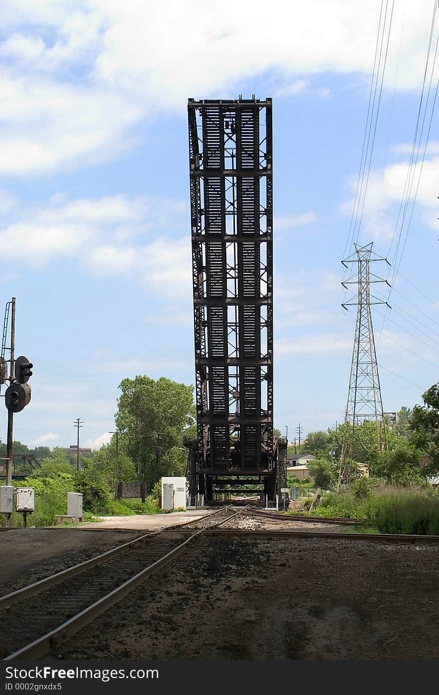 Railroad draw bridge in the up position. Bridge crosses the Cuyahoga River in the Flats industrial area of Cleveland, Ohio. Style of Drawbridge is called a Jack-Knife.