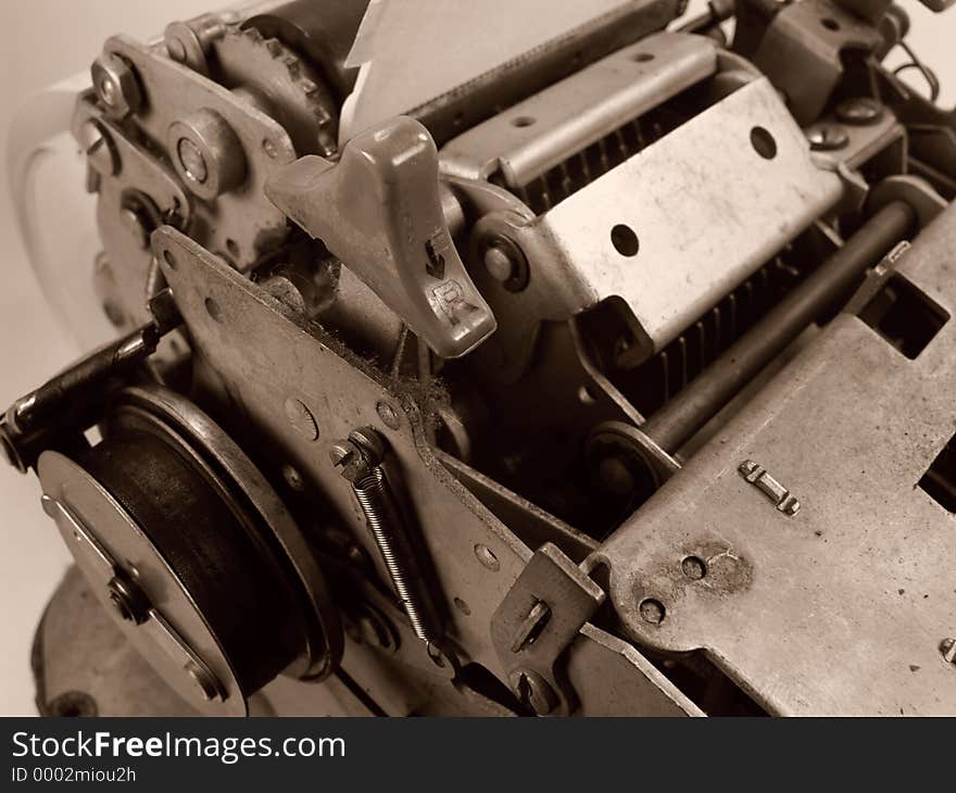 Photo of Adding Machine Inner Workings In Sepia Tone. Photo of Adding Machine Inner Workings In Sepia Tone