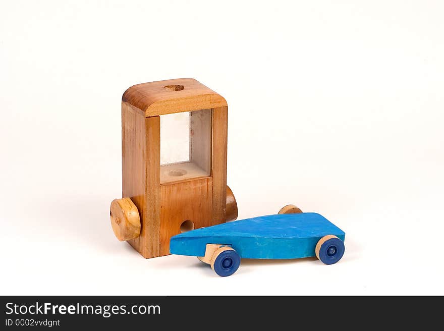 2 wood shop class projects from a junior high school shop class. One is a gravity race car and the other is a candy dispenser. 2 wood shop class projects from a junior high school shop class. One is a gravity race car and the other is a candy dispenser