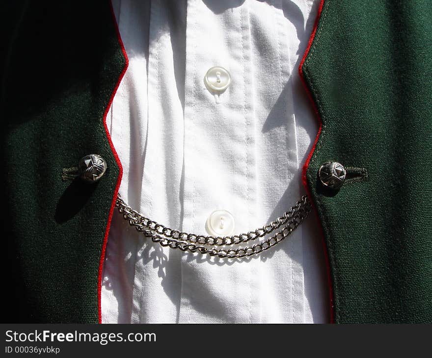 often the traditional bavarian waistcoats have no fixed buttons, but buttons connected with chains, so there is a bit more of the shirt to be seen. often the traditional bavarian waistcoats have no fixed buttons, but buttons connected with chains, so there is a bit more of the shirt to be seen.