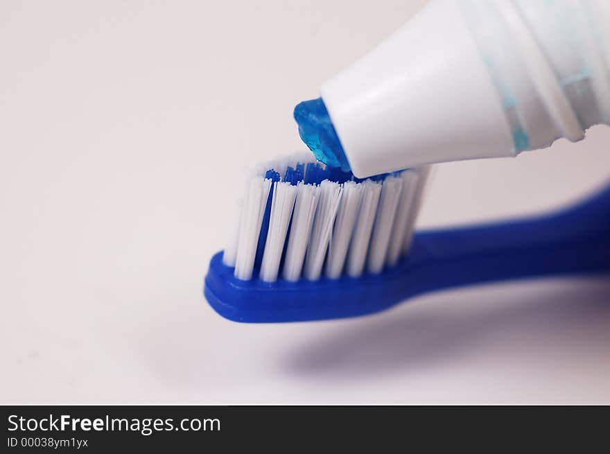 Photo of Paste Being Put on Toothbrush. Photo of Paste Being Put on Toothbrush