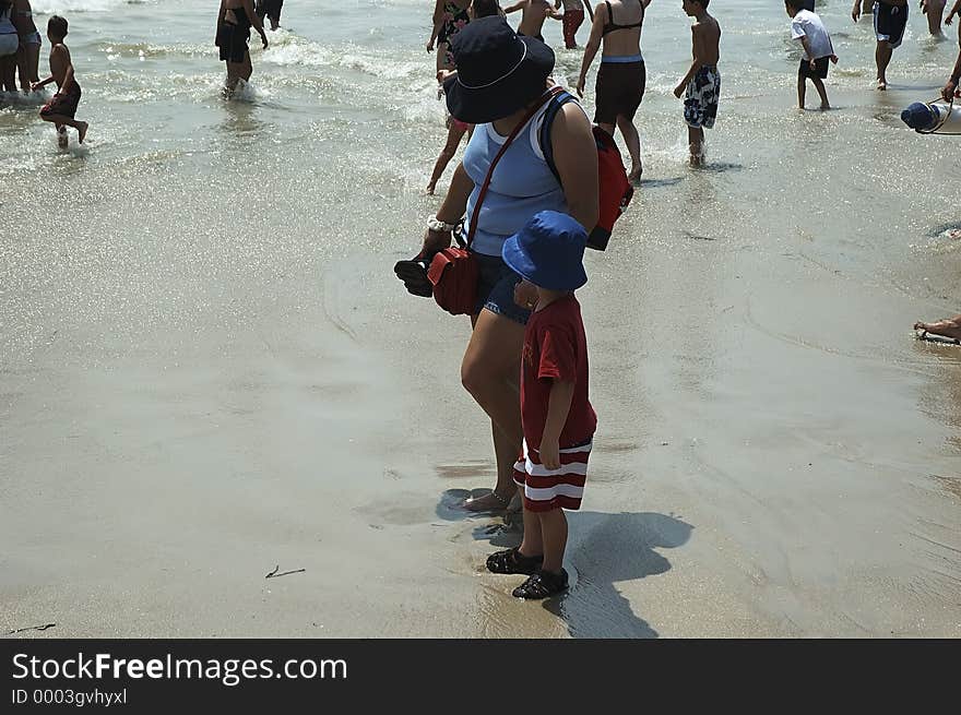 Photo of Mother and Child At Beach. Photo of Mother and Child At Beach