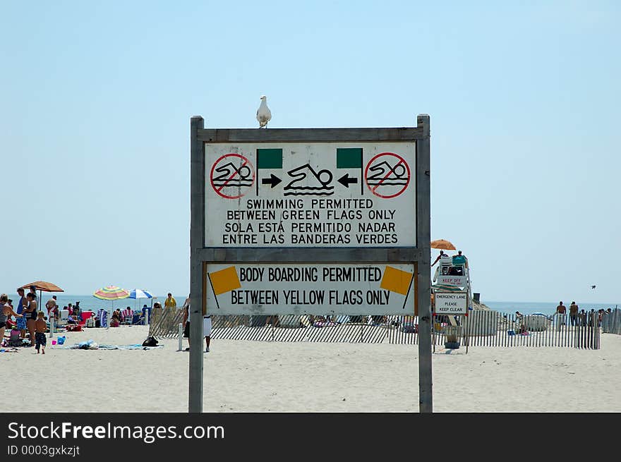 Photo of a Sign on the Beach. Photo of a Sign on the Beach