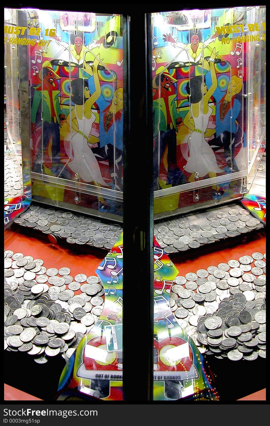 Picture of a coin game taken at a local fair. Picture of a coin game taken at a local fair.