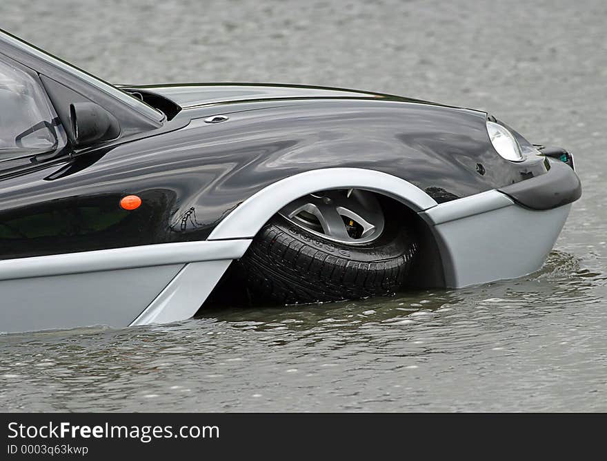 An aqua car transforming to a boat