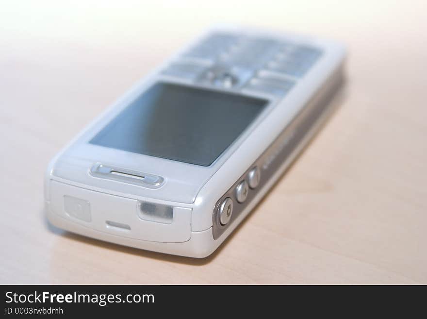 A white and silver Mobile Phone