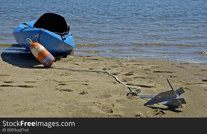 Anchored blue boat