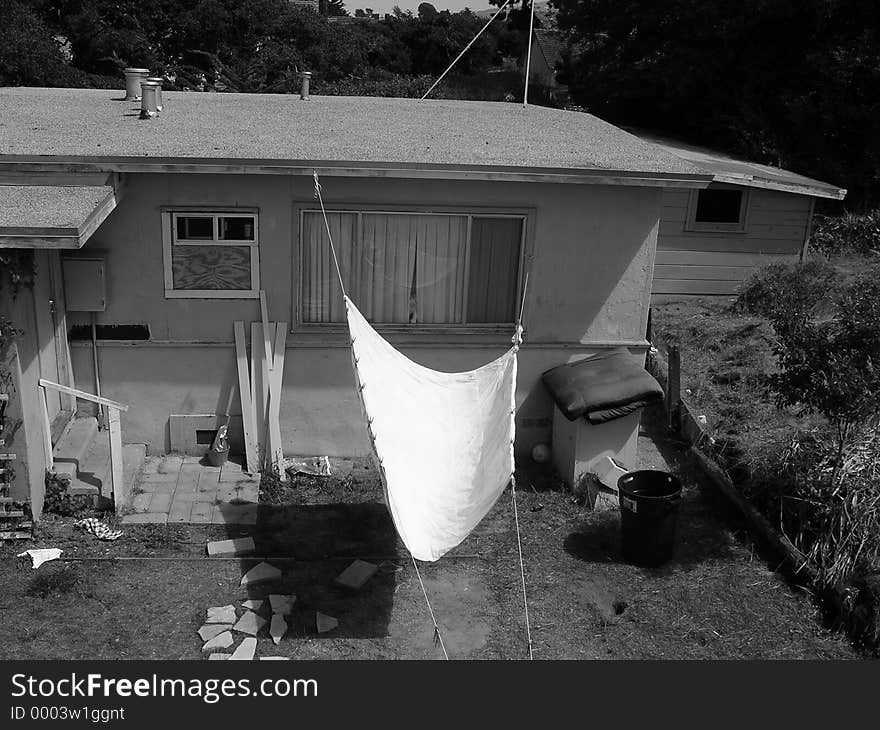 A down comorter hanging to dry. A down comorter hanging to dry.